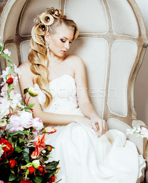beauty young blond woman bride alone in luxury vintage interior with a lot of flowers  Stock photo © iordani
