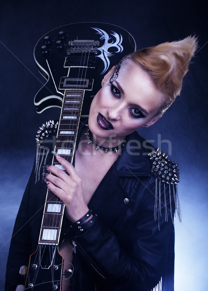 Divat rocker stílus modell lány portré Stock fotó © iordani