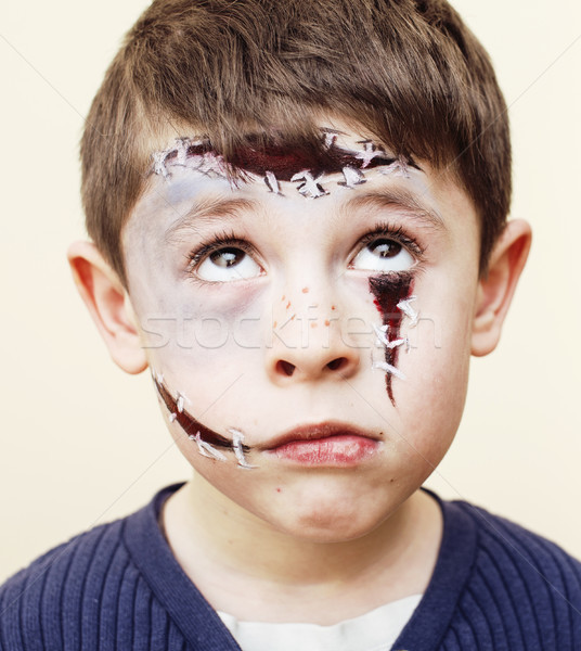 little cute boy with facepaint like zombie apocalypse at hallowe Stock photo © iordani