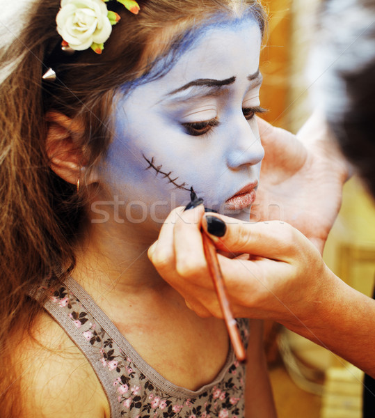 little cute child making facepaint on birthday party, zombie Apo Stock photo © iordani