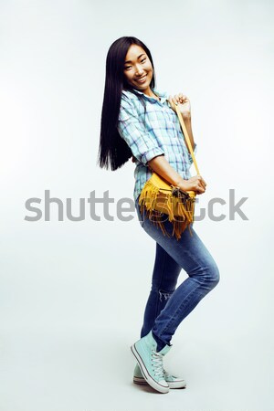 young pretty asian woman posing cheerful emotional isolated on white background, lifestyle people co Stock photo © iordani