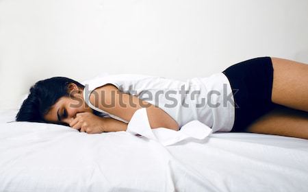 Сток-фото: молодые · довольно · женщину · кровать · белый