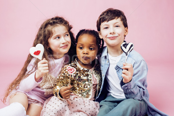lifestyle people concept: diverse nation children playing together, caucasian boy with african littl Stock photo © iordani