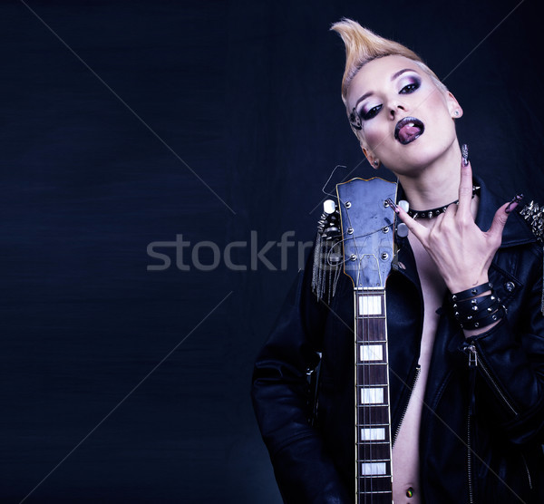Stock photo: Fashion Rocker Style Model Girl Portrait. Hairstyle.Punk Woman Makeup, Hairdo and black Nails. Smoky