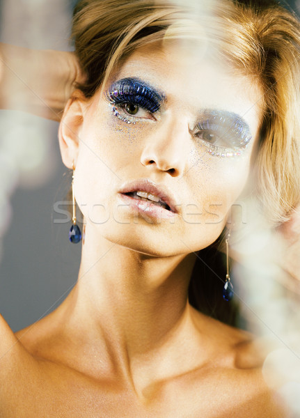 beauty young snow queen in fairy flashes with hair crown on her  Stock photo © iordani