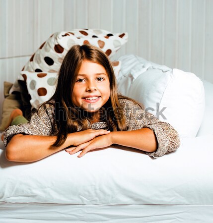 little cute brunette girl at home interior happy smiling close up, lifestyle real people concept Stock photo © iordani