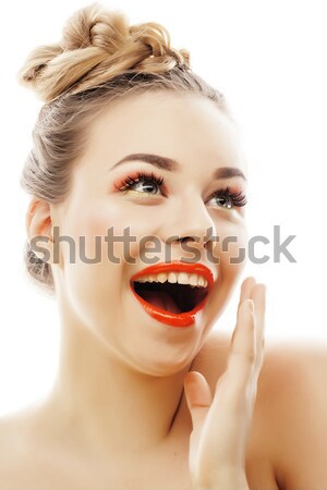 young blond woman with bright make up smiling pointing gesturing emotional isolated like doll lashes Stock photo © iordani