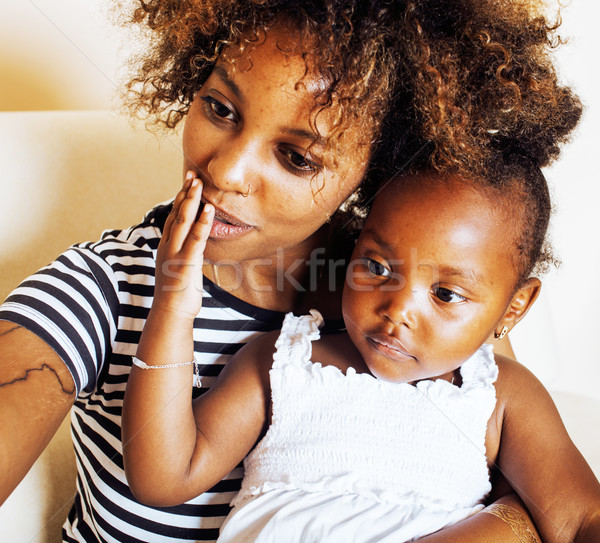 adorable sweet young afro-american mother with cute little daugh Stock photo © iordani
