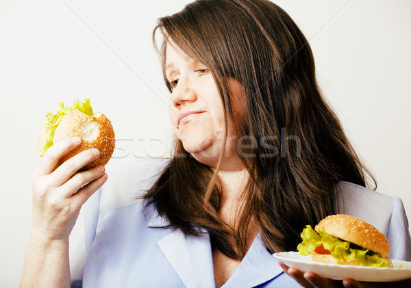 Kövér fehér nő választás hamburger saláta Stock fotó © iordani