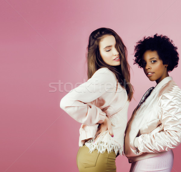 different nation girls with diversuty in skin, hair. Asian, scandinavian, african american cheerful  Stock photo © iordani