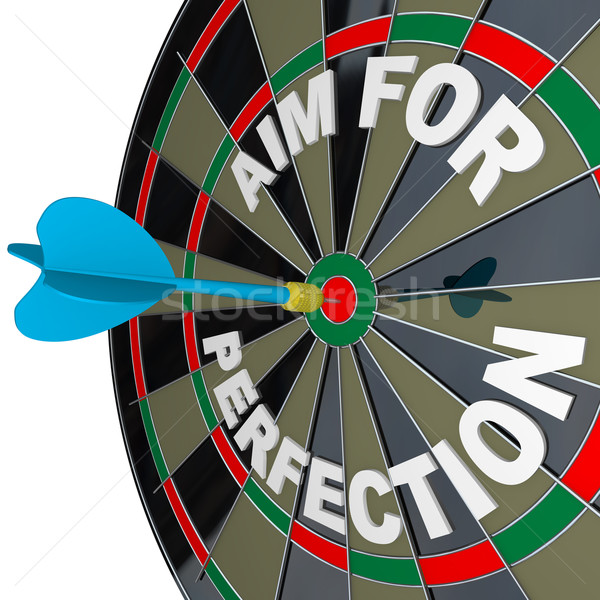 Aim for Perfection - Dart Hits Target Bulls-Eye on Dartboard Stock photo © iqoncept