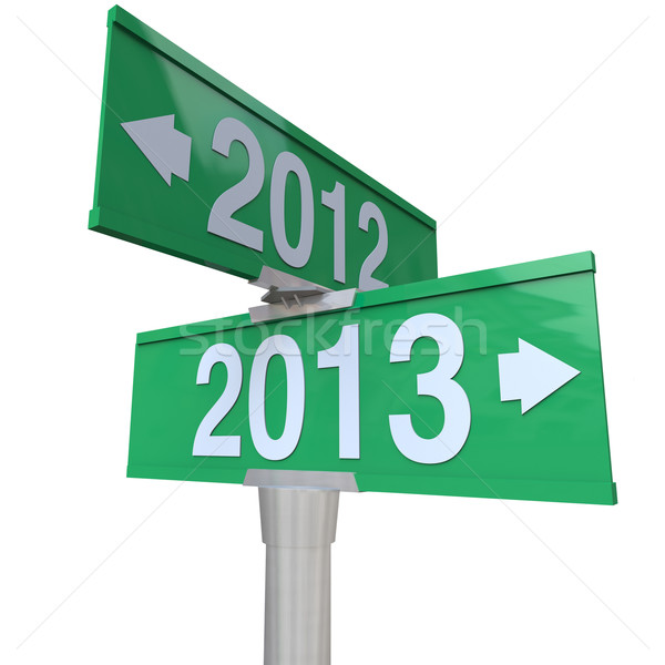 2012 Year Changing to 2013 Green Two-Way Road SIgns Stock photo © iqoncept