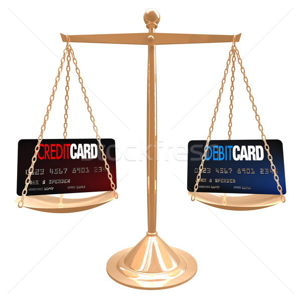 Foto stock: Crédito · vs · cartão · de · débito · escala · diferenças · dinheiro