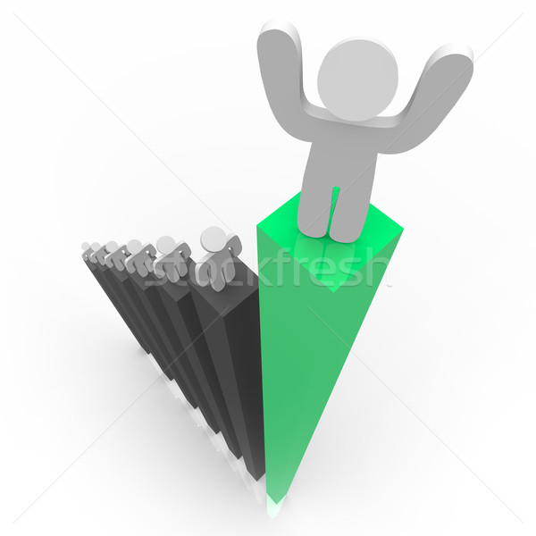 Standing Atop Green Bar Graph Stock photo © iqoncept