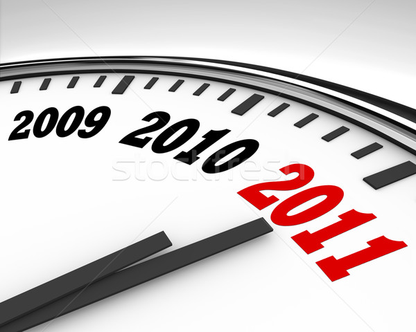 [[stock_photo]]: 2011 · horloge · compte · à · rebours · nouvelle · année · blanche · mains