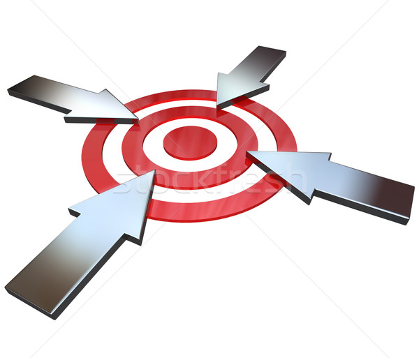 Four Competing Arrows Point at Bulls-Eye Target  Stock photo © iqoncept