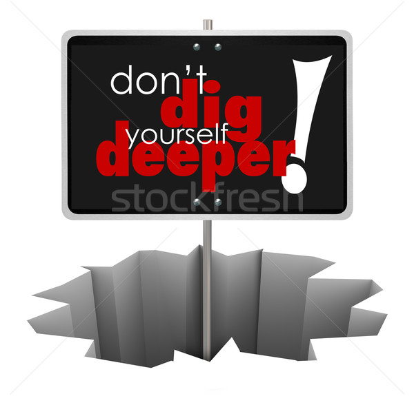 Don't Dig Yourself Deeper Sign Deeper SIgn in Hole Stock photo © iqoncept