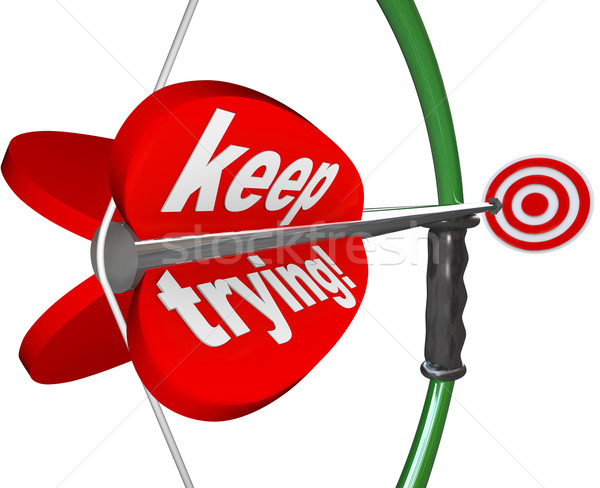 Keep Trying Words Bow Arrow Aiming Bulls-Eye Target Stock photo © iqoncept