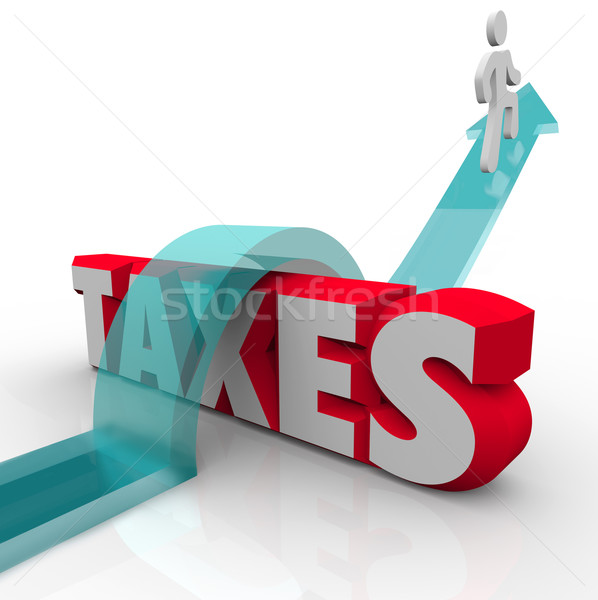 Taxes Word Man Jumping Over Money Owed Government Loophole Avoid Stock photo © iqoncept