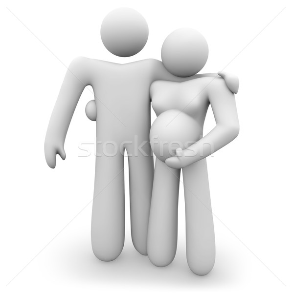 Expectant Couple Embracing - Awaiting Baby Stock photo © iqoncept