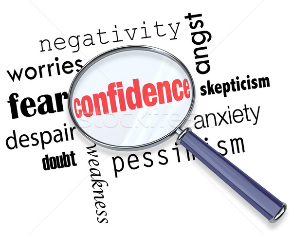 Stock photo: Searching for Confidence - Magnifying Glass