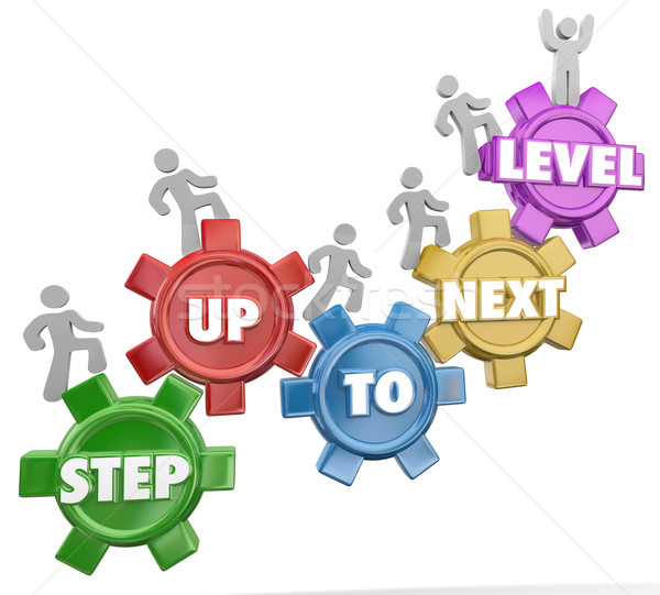 Step Up to Next Level Gear Marchers Rising Success Achievement Stock photo © iqoncept