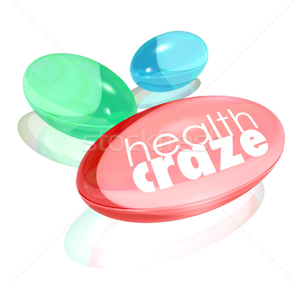 Health Craze Words Dietary Supplement Vitamin Capsules Stock photo © iqoncept