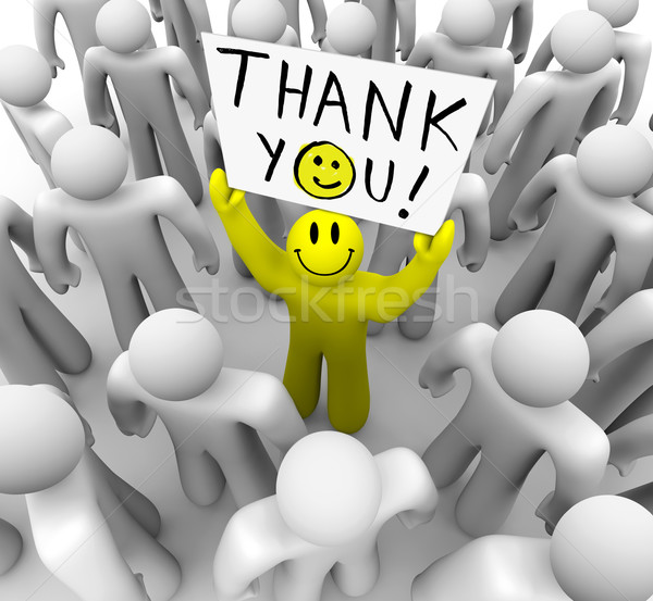 Smiley Face Person Holding Thank You Sign Stock photo © iqoncept