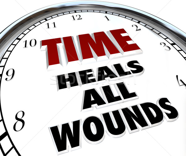 Time Heals All Wounds Clock Saying - Forgiveness of Disputes Stock photo © iqoncept