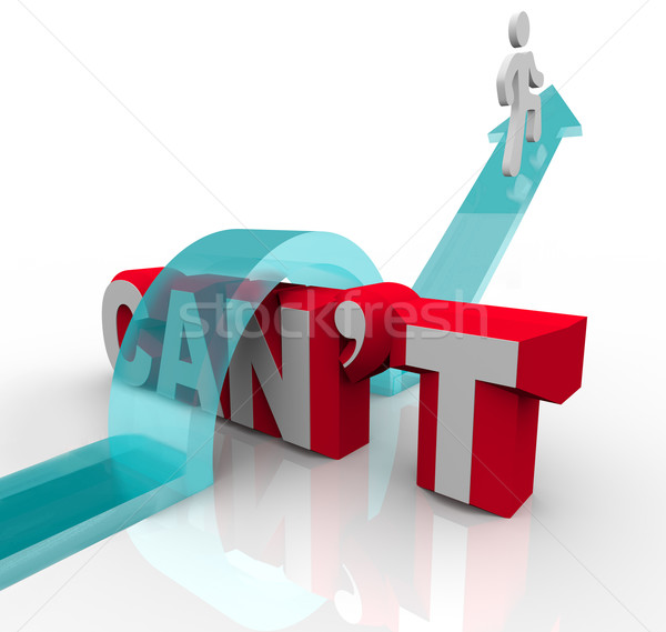 Person Climbing Over Word Can't to Achieve Goal Success Stock photo © iqoncept