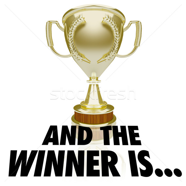 Stock photo: And the Winner Is Gold Trophy Award Prize Announcement