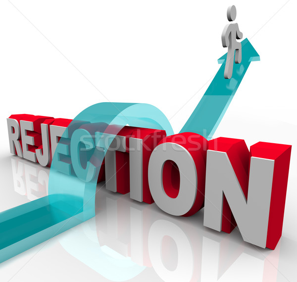 Getting Over Rejection - Arrow Jumping Over Word Stock photo © iqoncept