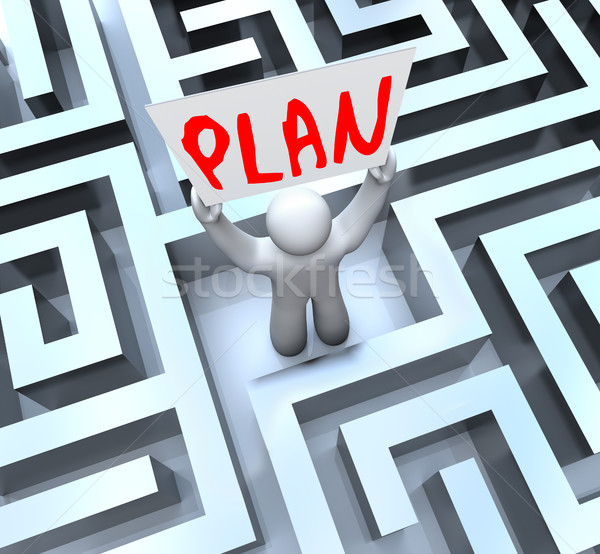 Plan Man Holding Sign in Maze Labyrinth Stock photo © iqoncept