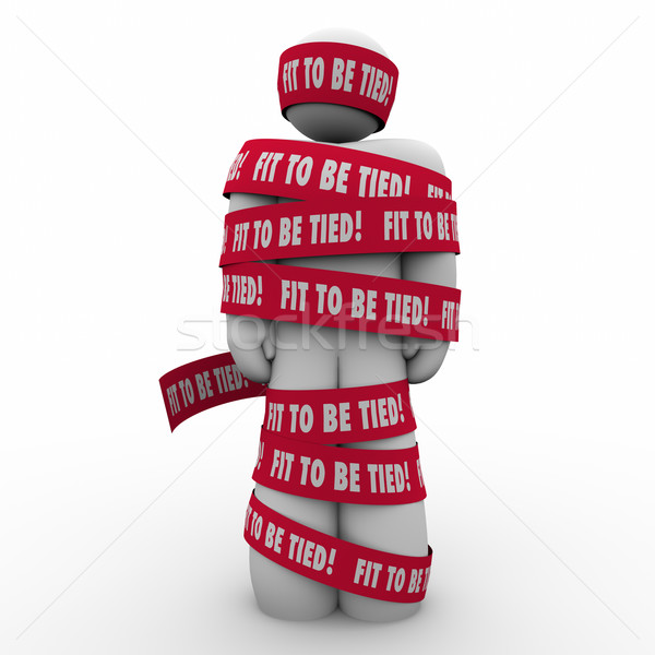 Fit To Be Tied Man Wrapped in Tape Frustrated Stressed Stock photo © iqoncept