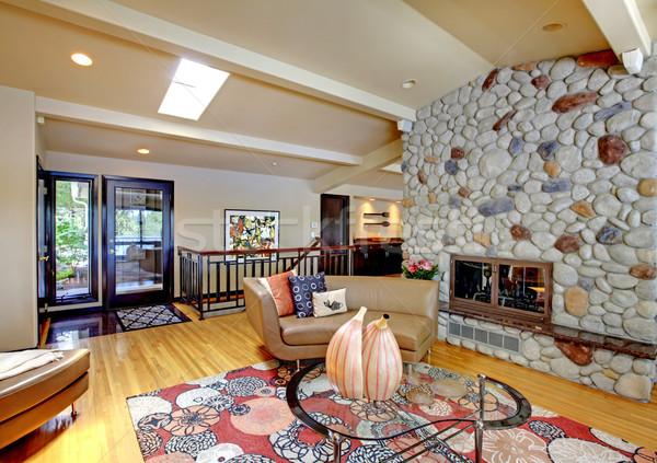 Open modern luxury home interior living room and stone fireplace. Stock photo © iriana88w