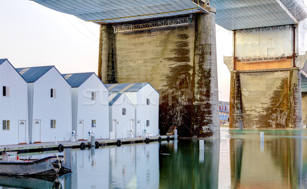 White boat houses under large bridge. Tacoma, downtown. Stock photo © iriana88w