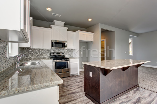 Unique kitchen with gray hardwood floor. Stock photo © iriana88w