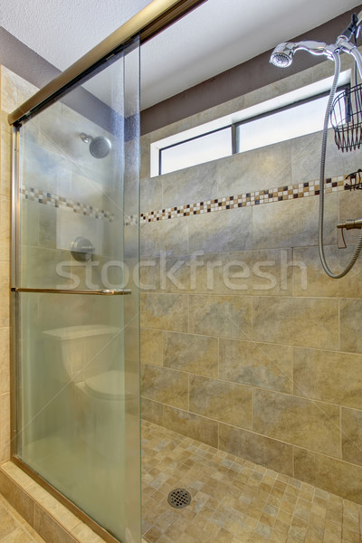 luxury shower with tile and removable shower head. Stock photo © iriana88w