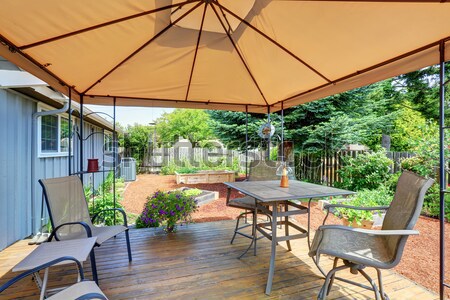 Northwest traditional wooden deck with chairs. Stock photo © iriana88w