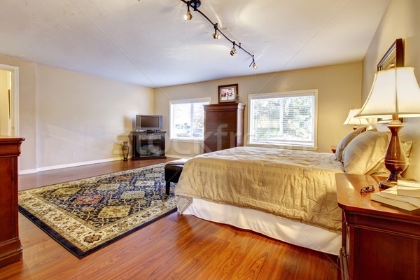 Large bedroom with hardwood floor and two dressers. Stock photo © iriana88w