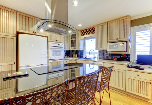 Brilhante confortável cozinha bege branco teto Foto stock © iriana88w