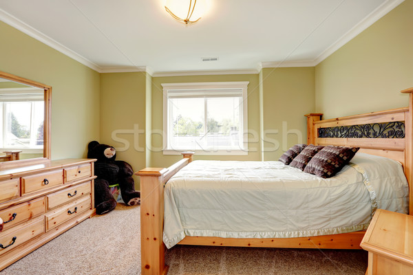 Cozy lime bedroom with big toy bear Stock photo © iriana88w