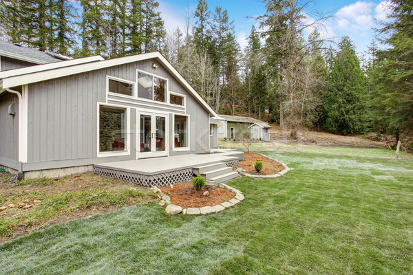 Lovely back yard with porch, and grass. Stock photo © iriana88w