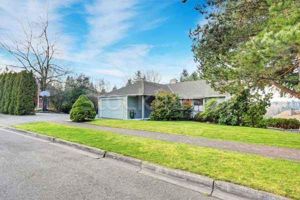 Small blue rambler house with garage and walkway. Stock photo © iriana88w