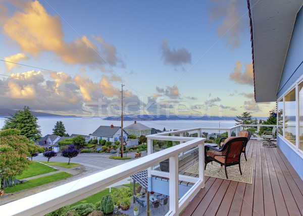 Nicely furnished screened deck overlooking beautiful scenery. Stock photo © iriana88w