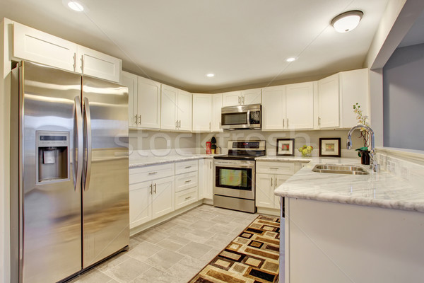 Bright kitchen with marble counters. Stock photo © iriana88w