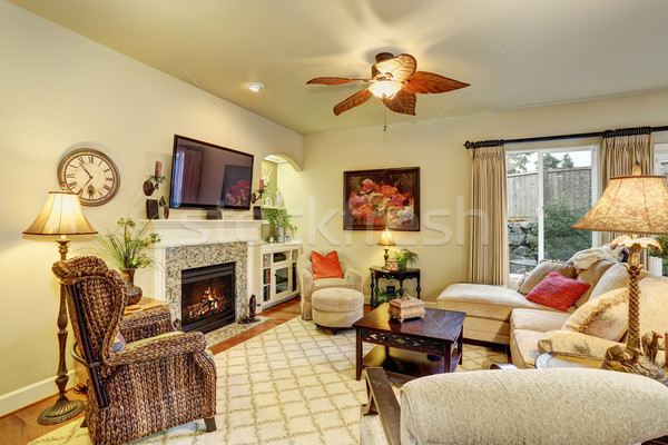 Cozy living room with rug and fireplace. Stock photo © iriana88w