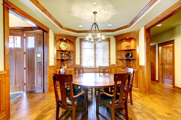 Stock photo: Luxury mountain home diining room with wood molding.