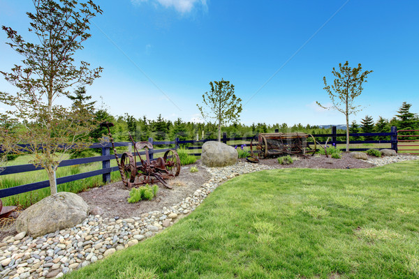 Stock photo: Backyard beautiful spring landscape with fence and forest. 