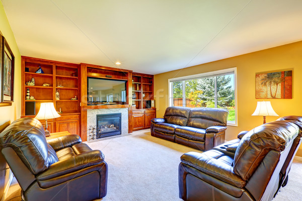 Stock photo: Family room with rich leather furniture set